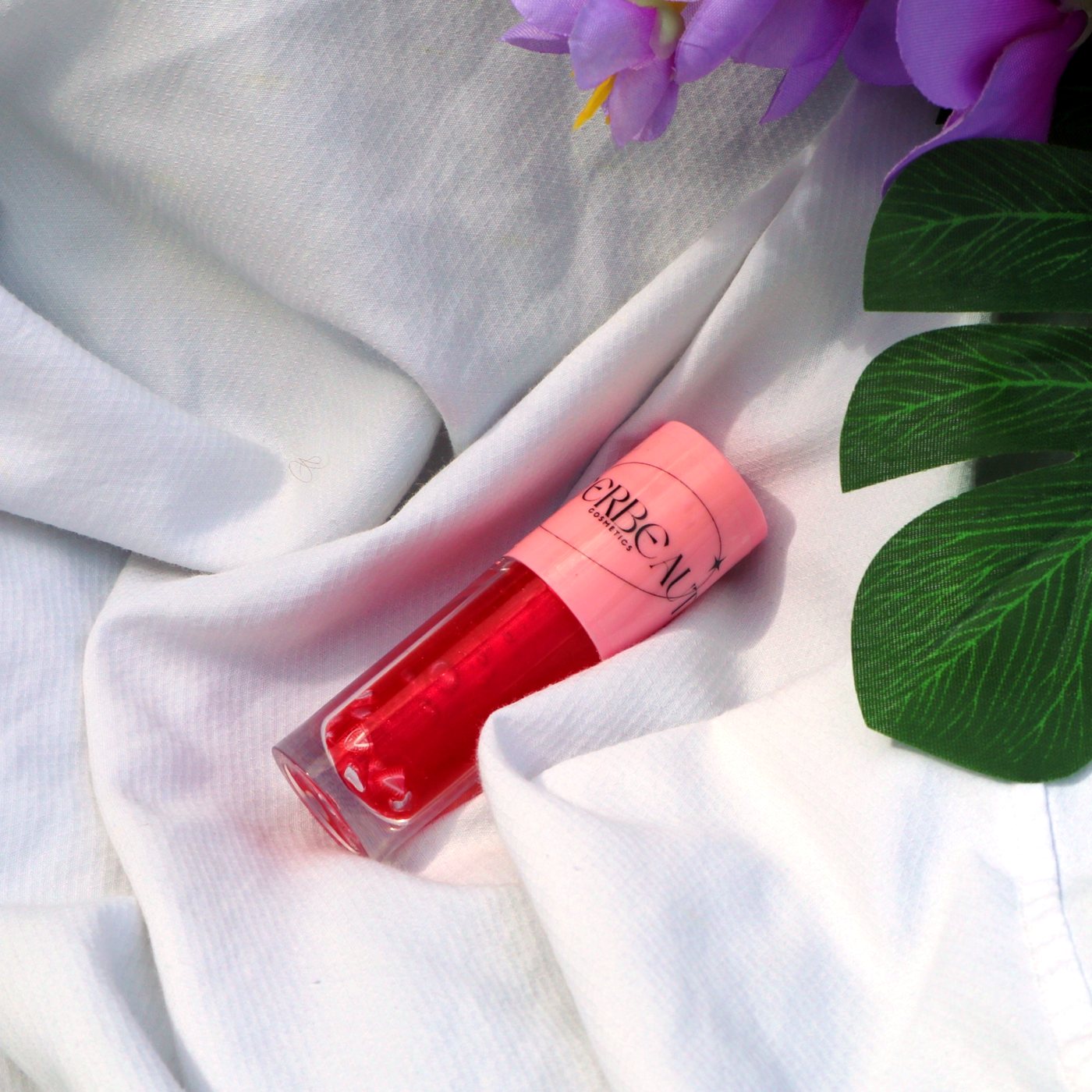Bare Berry, high shine shimmering jelly gloss, in a pink-capped MEERBEAUT wand tube
